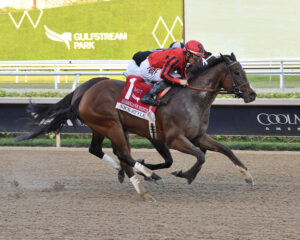 Florida-bred Thoroughbred Nic’s Style and jockey Junior Alvarado gallop past fellow Florida-bred R Disaster, who is guided by jockey Edgard Zayas on the inside rail. Nic’s Style and R Disaster raced together to the wire, with Nic’s Style winning the 2025 Grade 3 Hurricane Bertie at Gulfstream Park by a neck. (Photo: ©Lauren King)