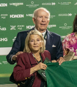Alex and JoAnn Lieblong stand in the winner's circle together after their homebred, Reef Runner, won the 2026 1351 Turf Sprint (G2). (Photo: ©Mathea Kelly/JCSA)