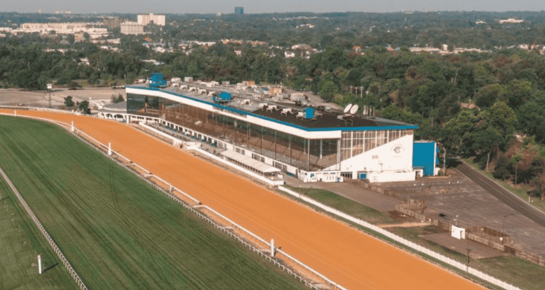 Aerial image taken of the grandstands at Laurel Park. The dirt and turf tracks stretch out in front of the stands. (Photo: ©Maryland Jockey Club)