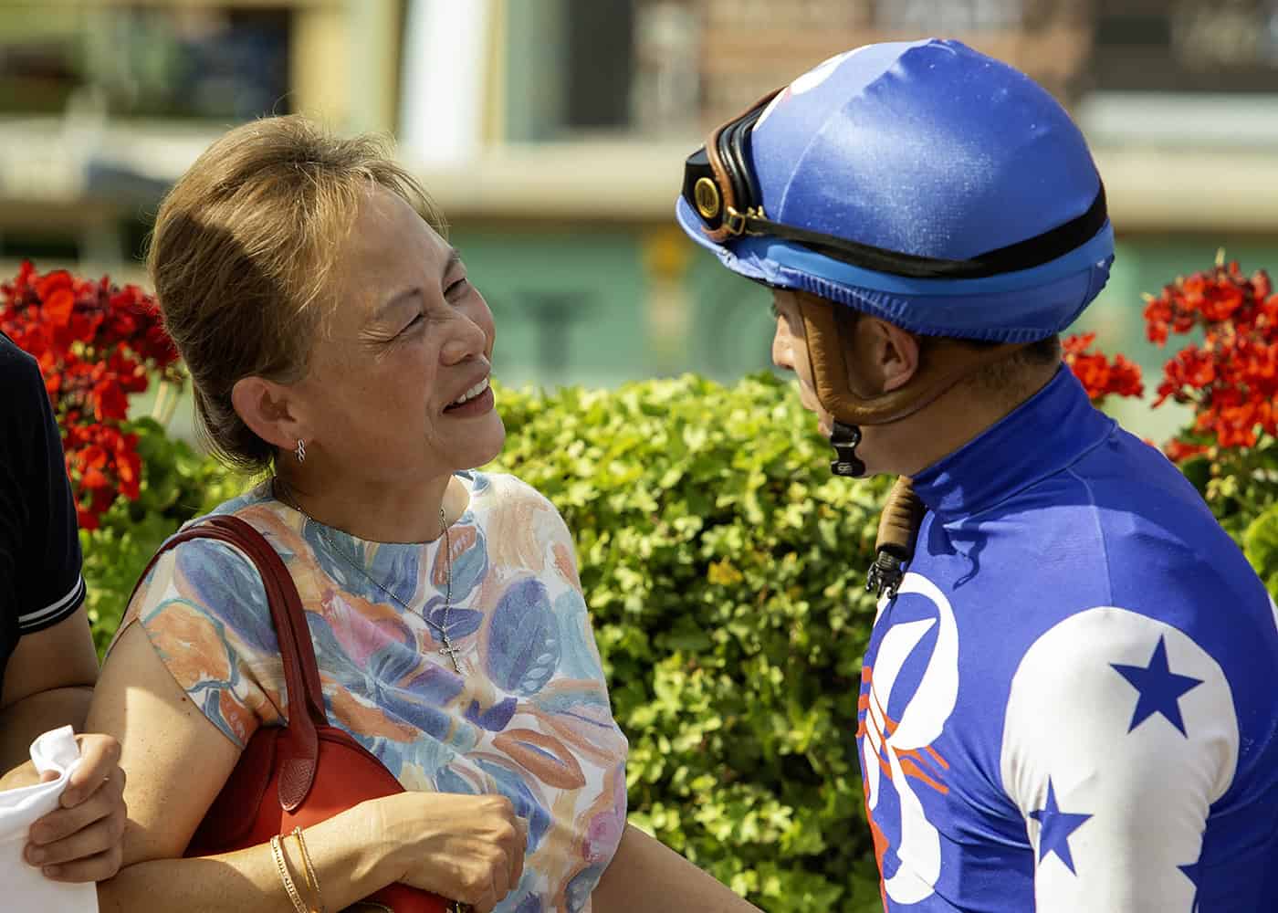Nysos' owner Susan Chu and jockey Juan Hernandez enjoy a moment after victory in the the Grade III $100,000 Triple Bend Stakes Saturday, May 31, 2025 at Santa Anita Park, Arcadia, CA. Benoit Photo.