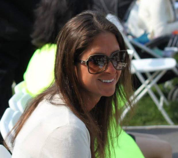 Closely cropped headshot of Thoroughbred breeder Dominique Damico, who smiles for the photo. (Photo Courtesy Dominique Damico)