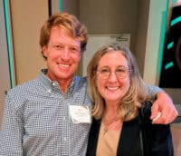 Ben Masters and Ann Louise Drake stand together for a photo, smiling at the camera. (Photo: ©Tammy Gantt)