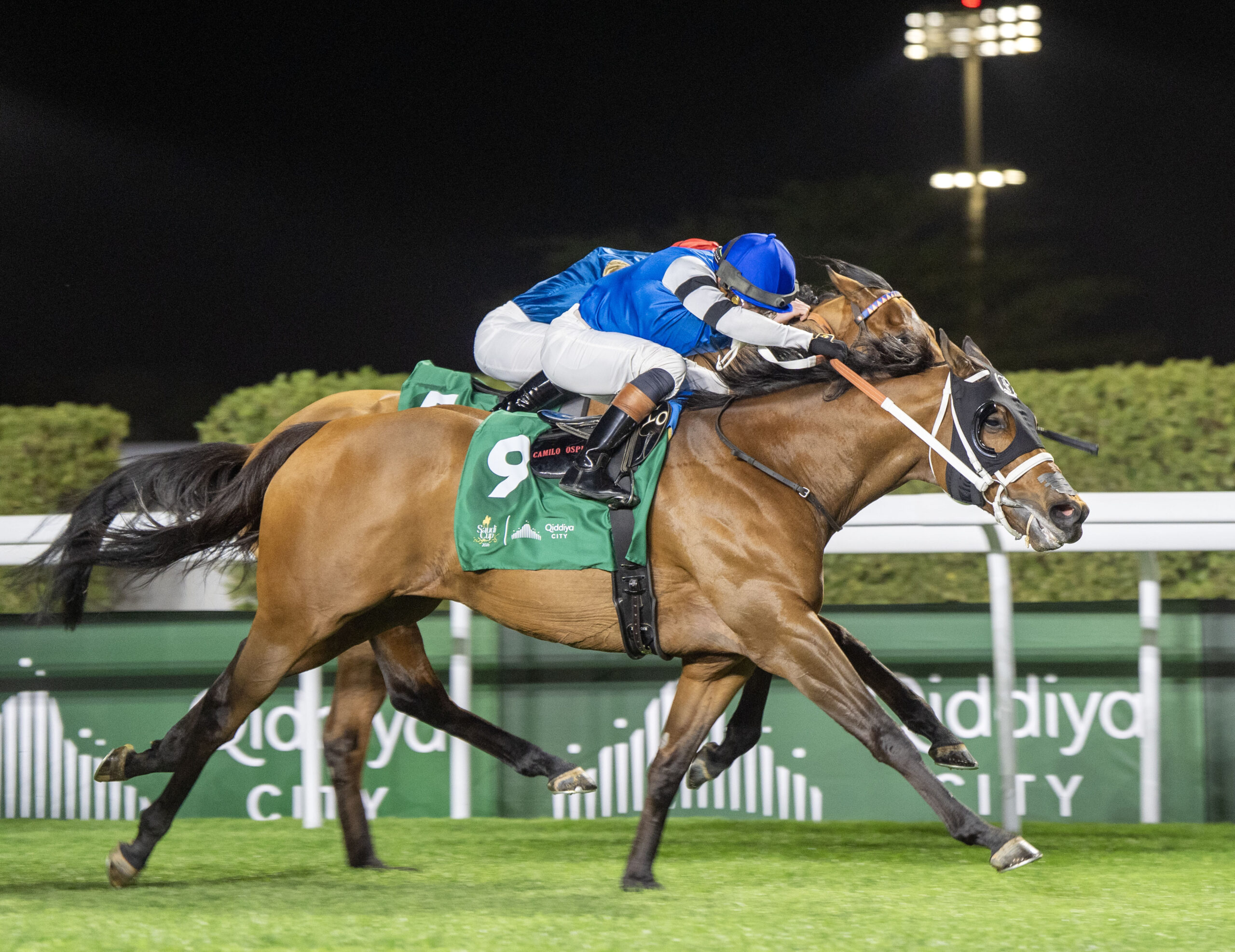 Florida-bred Thoroughbred Reef Runner, ridden by jockey Irad Ortiz Jr., stretches out in a gallop to the wire at King Abdulaziz Racecourse. Reef Runner and Ortiz fought back competition incoming on the inside rail, holding the lead and winning the 2026 1351 Turf Sprint. (Photo: ©Mathea Kelley/JCSA)