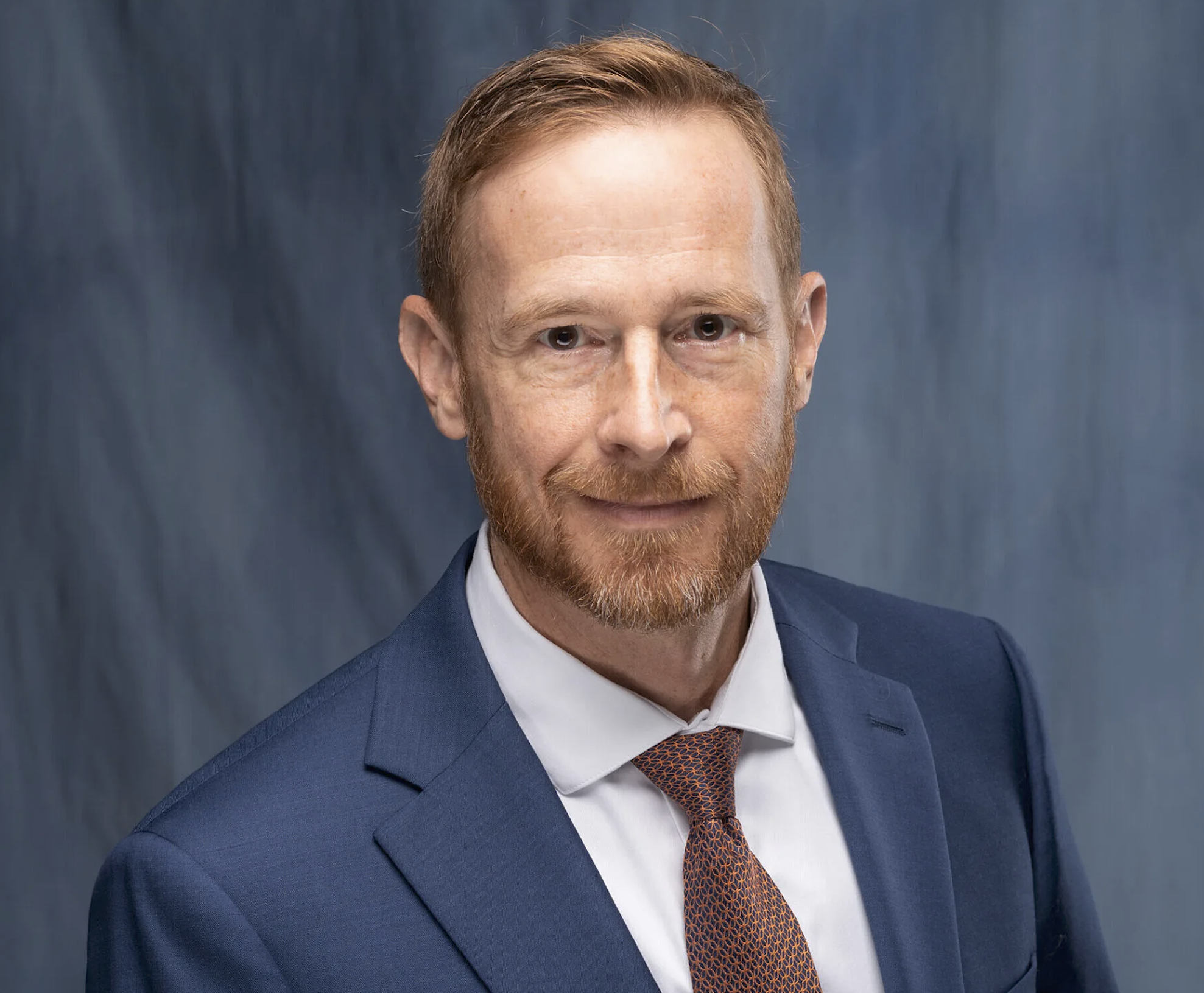 Professional headshot of Dr. Christopher Adin, D.V.M., DACVS. Photo Courtesy of UF Health News.