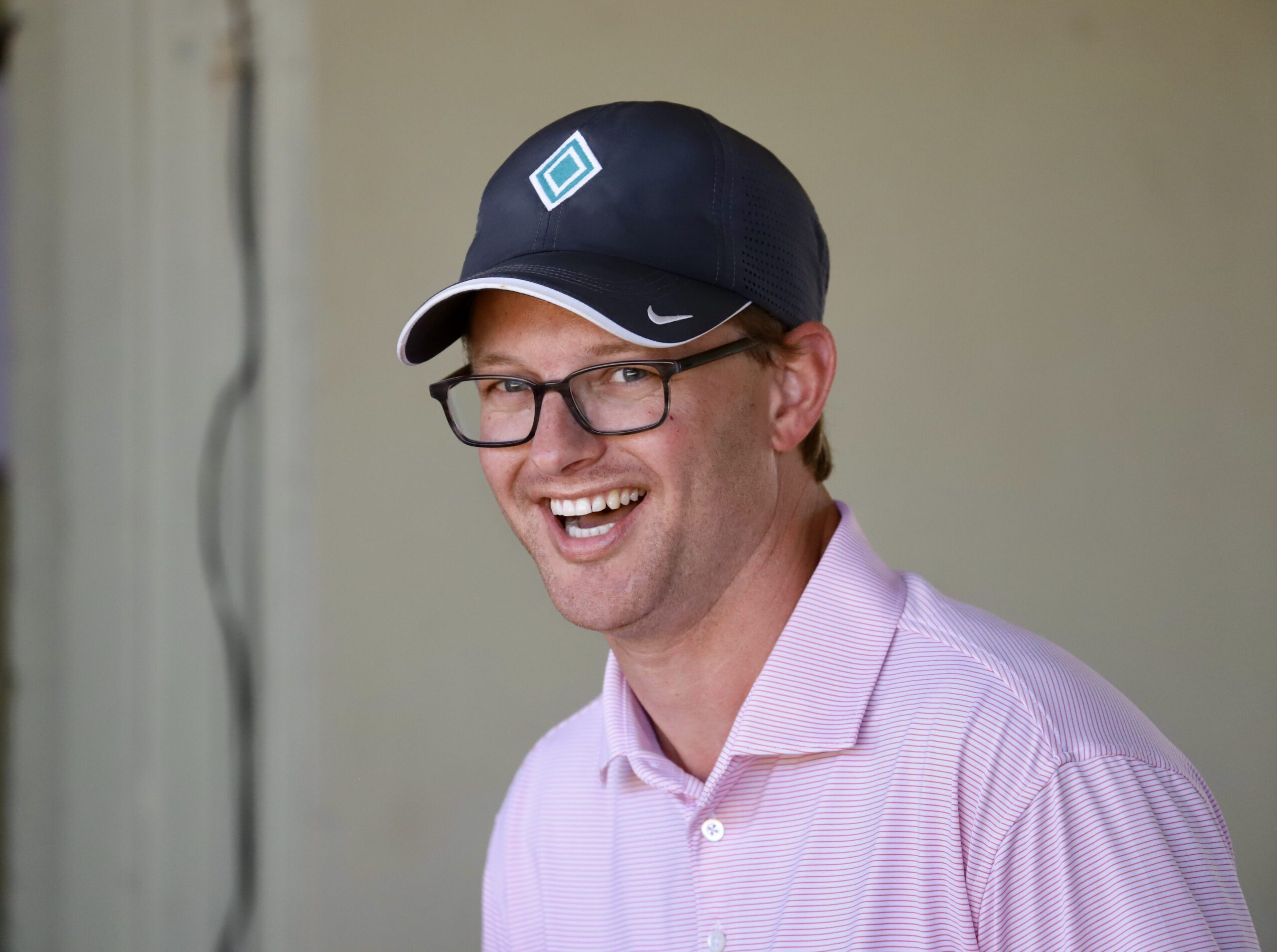Candid headshot of trainer Riley Mott, laughing while the photo is taken. (Photo: ©OBS)