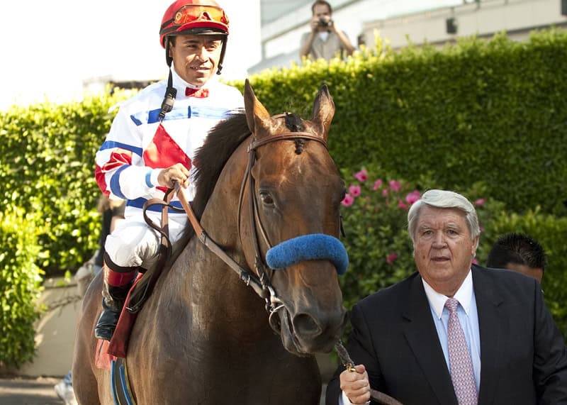 Owner Donald R. Dizney guides First Dude and jockey Martin Garcia into the winner's circle after their victory in the 2011 Hollywood Gold Cup at Hollywood Park