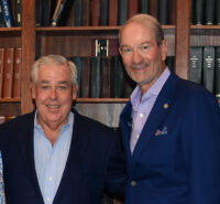 Closely cropped photo taken of John Morgan (left) and George Isaacs (right), smiling together for a photo. (Photo: ©Judit Seipert)