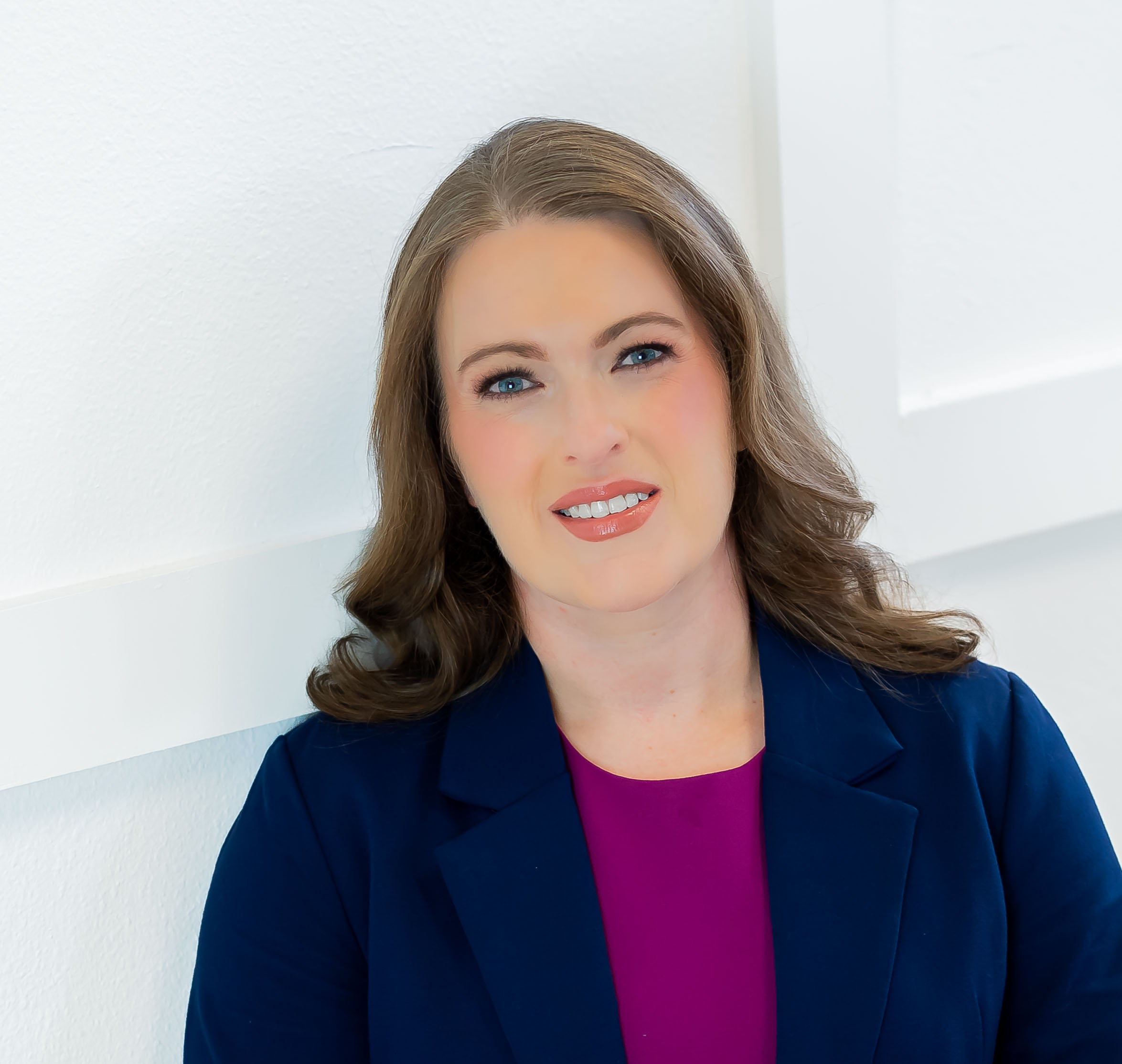 Formal headshot photo of Liz Stinson.